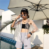 Camisa retro informal de manga corta de plástico transparente